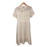 Ivory Elegance: Smocked Cotton Midi Dress